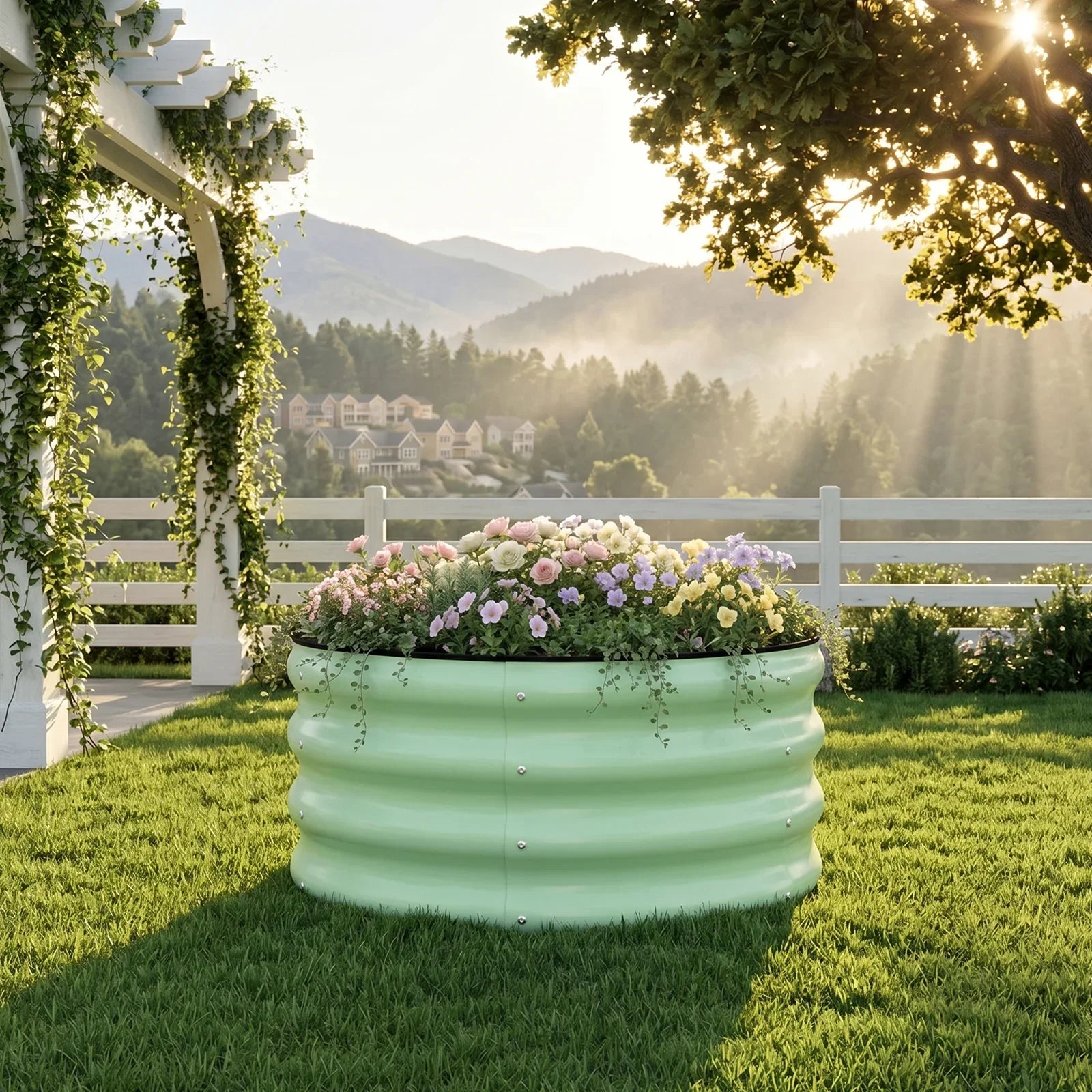 Round metal raised garden bed with colorful flowers on sunny lawn near white pergola