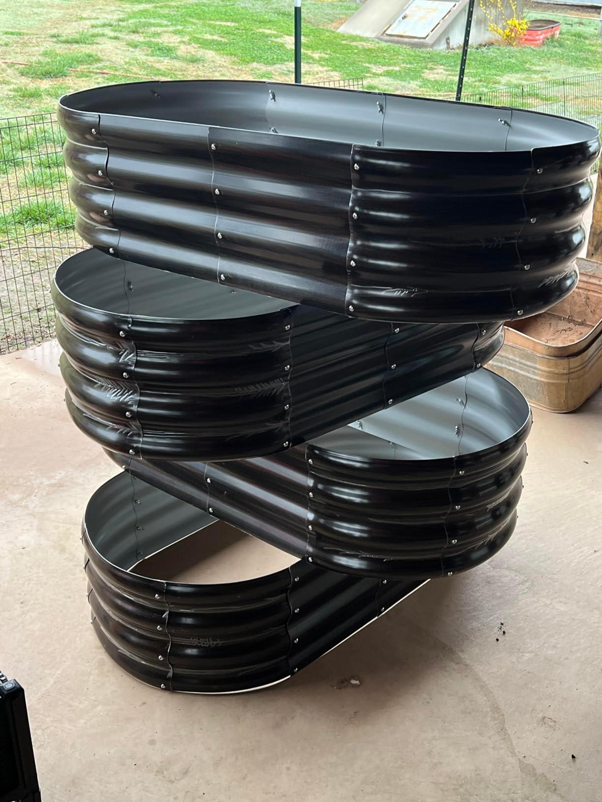 Black metal raised garden beds stacked outdoors, durable and stylish for American gardens