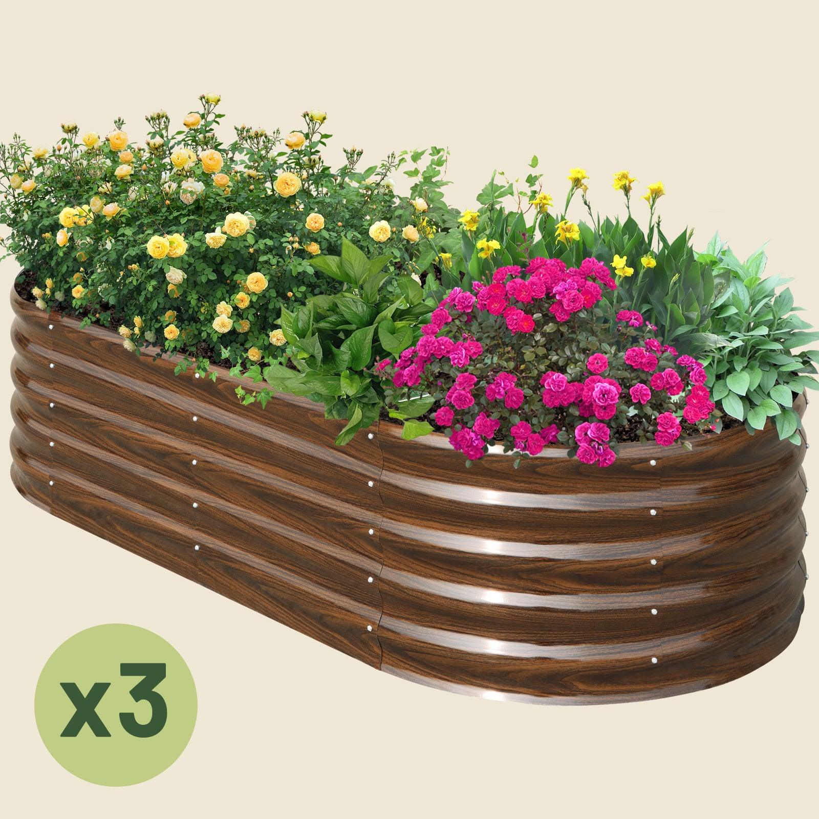 Wood-look metal raised garden bed with yellow and pink flowers, ideal for American gardens