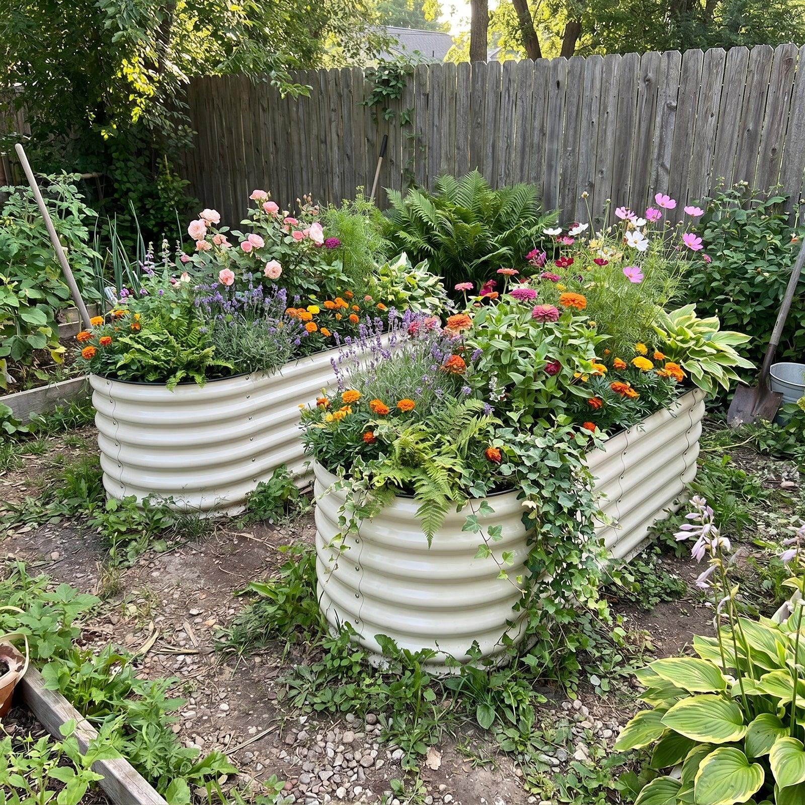 Metal raised garden beds filled with colorful flowers and greenery in a backyard setting