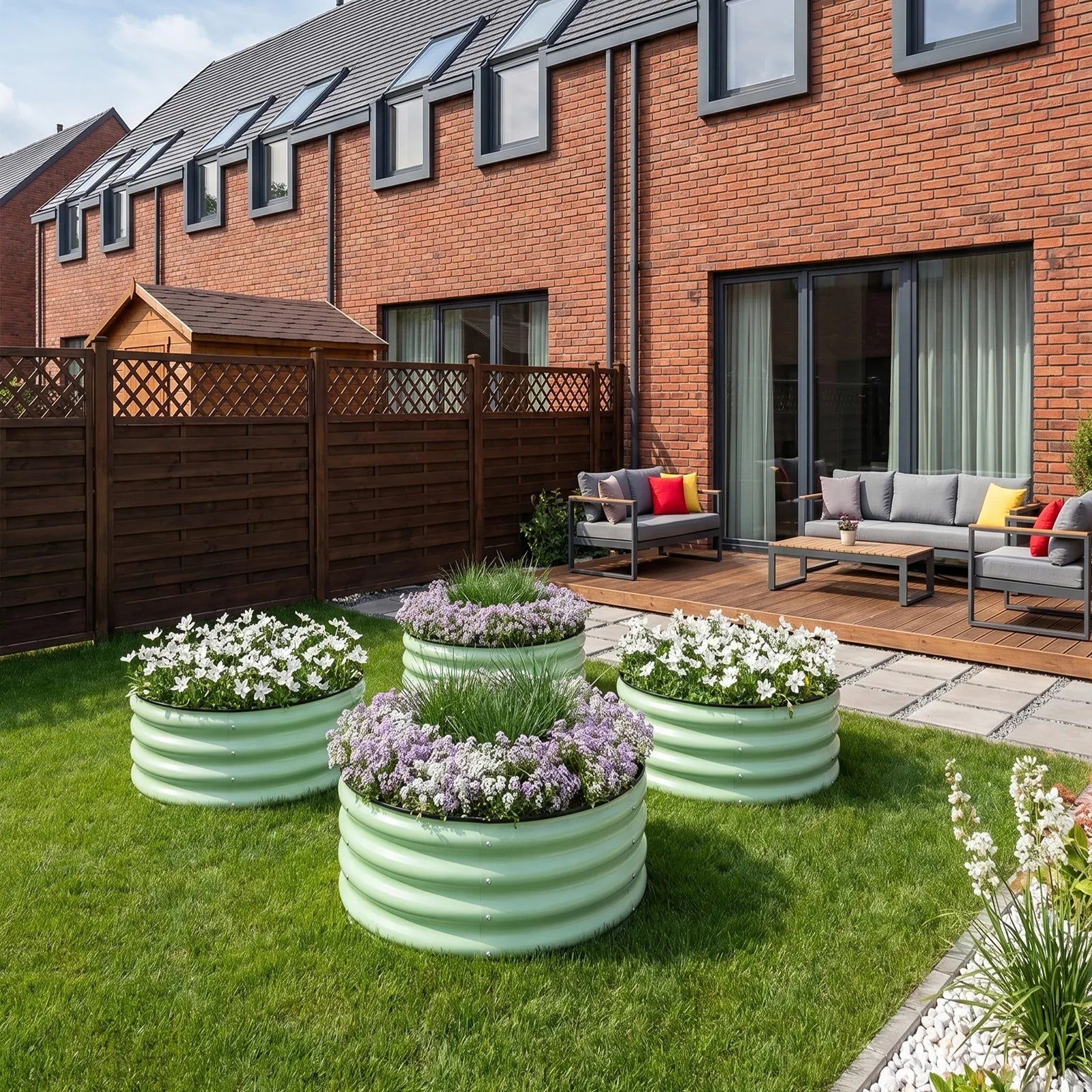 Round metal raised garden beds with flowers in a backyard, perfect for modern outdoor spaces